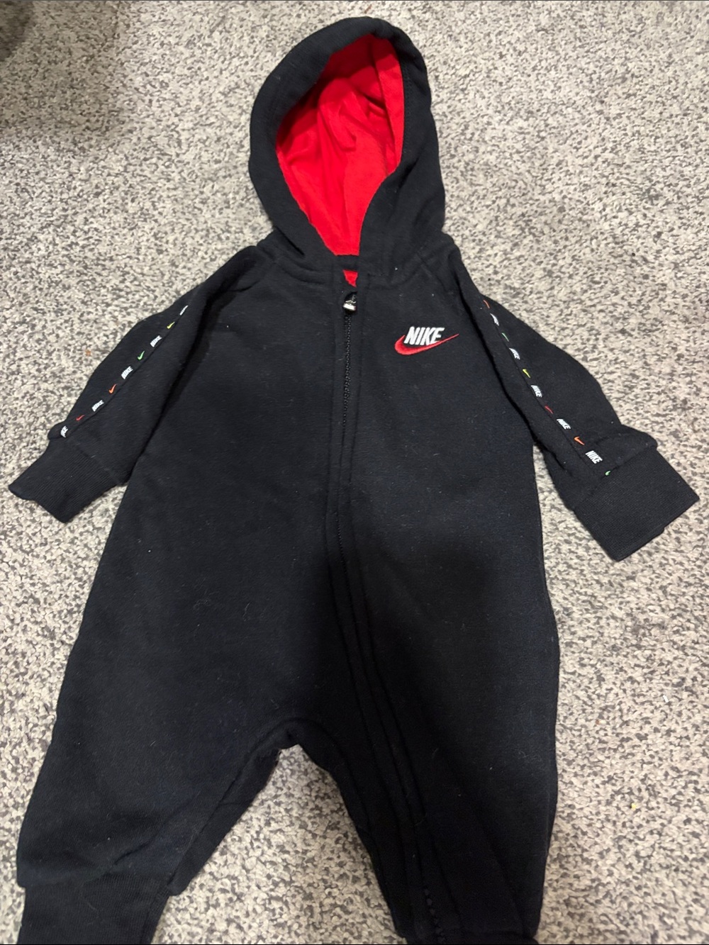 Nike Black One-Piece with Red Hood Lining and Logo